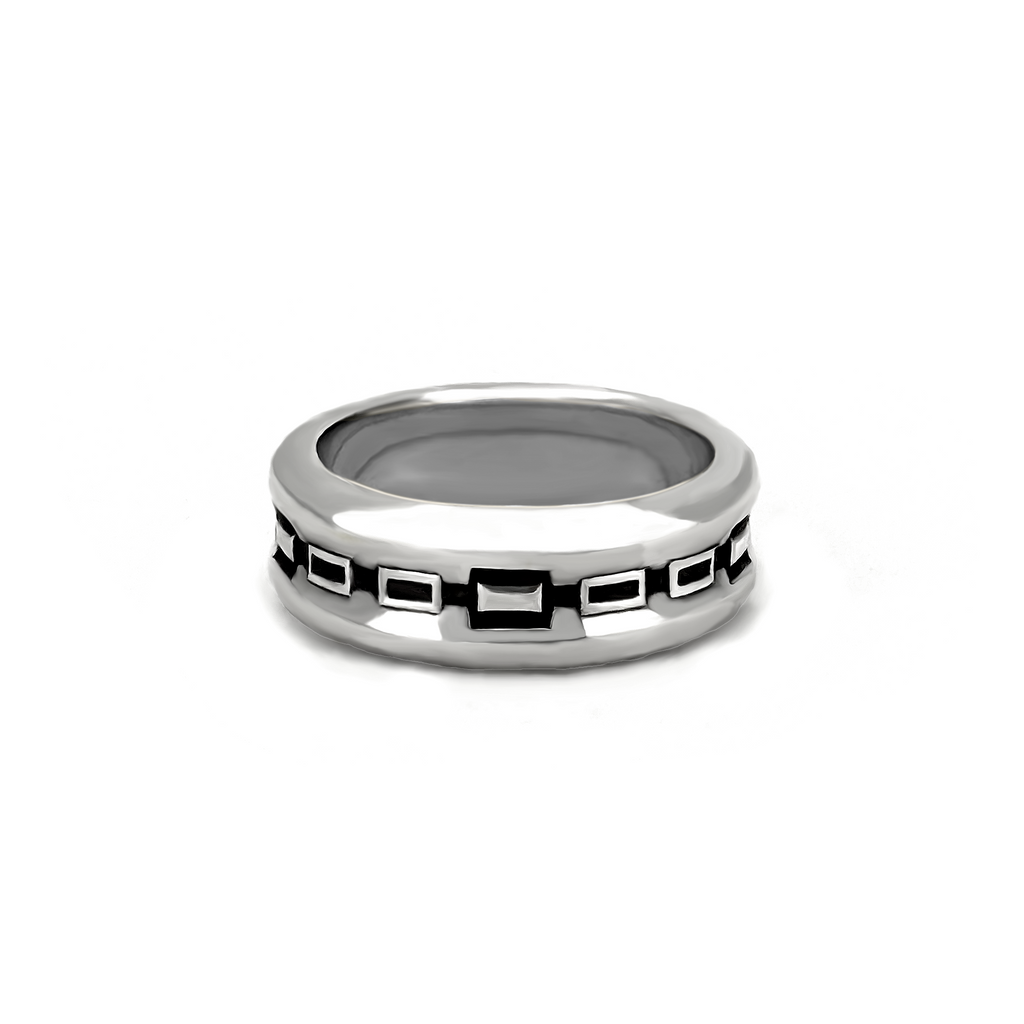 Silver band ring with black geometric detailing. 