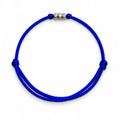 Adjustable blue cord bracelet with silver geometric beads