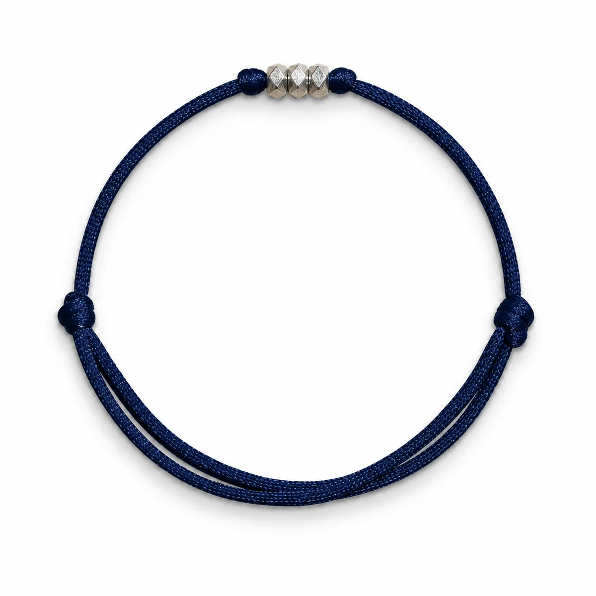 Adjustable navy blue cord bracelet with silver geometric beads